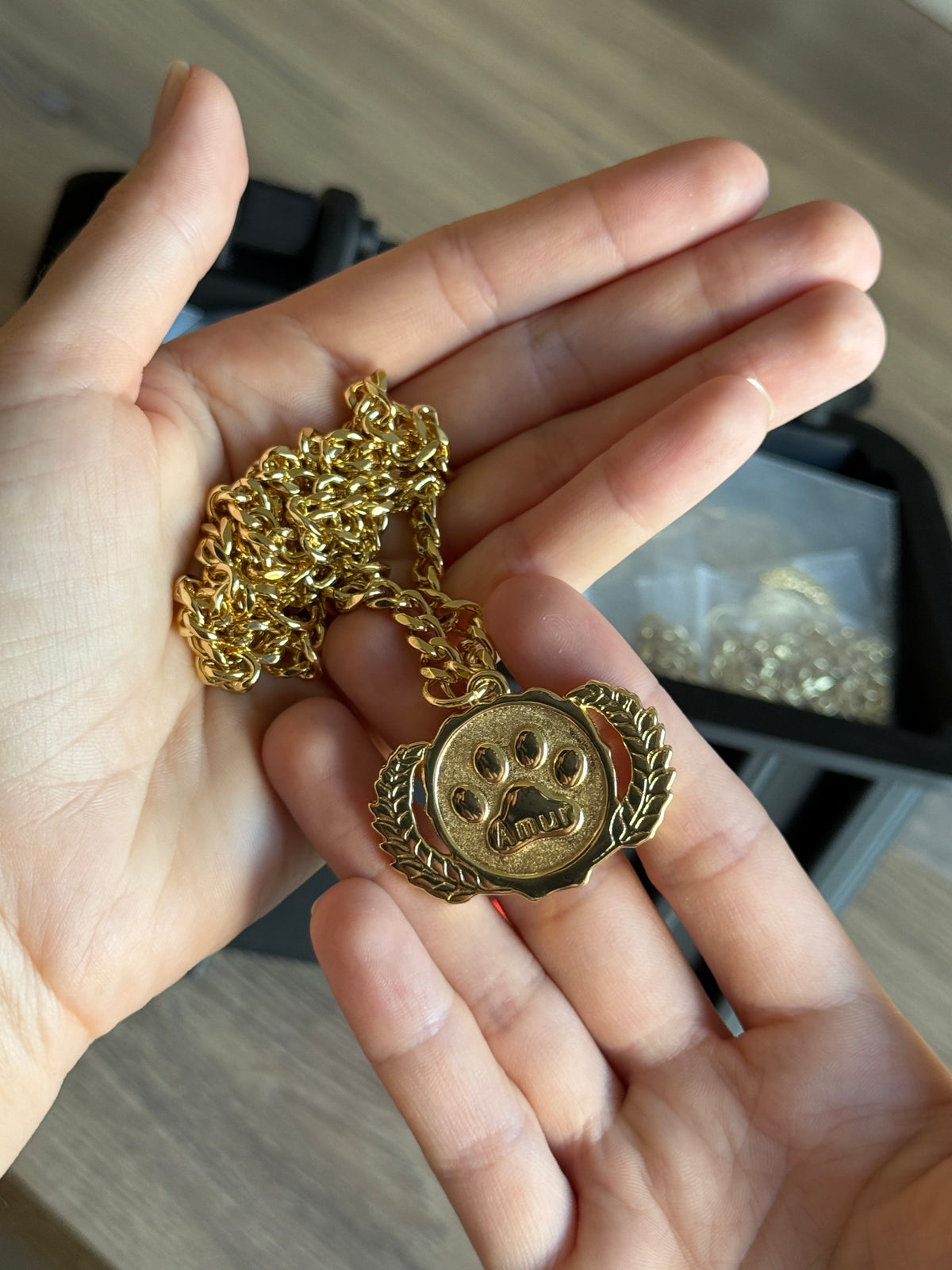 Gold logo and Amur
